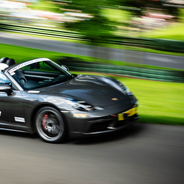 Porsche at Prescott 2019, #48 grey porsche convertible at speed during the porsche at prescott hill climb event