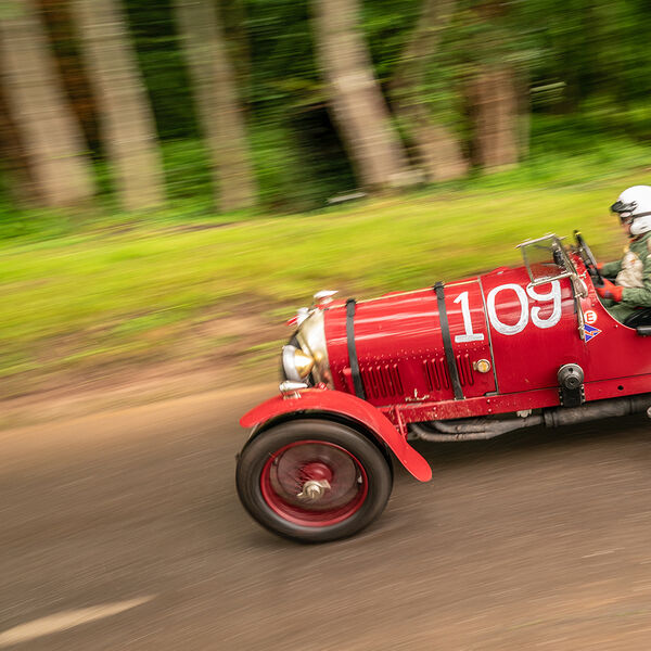 ssshoot-shelsley-walsh-VSCC-04072021-22 red vintage bentley open top sports car returing to the paddock at the shelsley walsh VSCC event