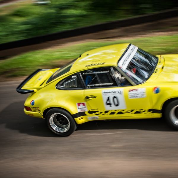 Best of British 2019, Shelsley Walsh, #60 classic yellow whale tail porsche 911 turbo powering up shelsley walsh hill climb
