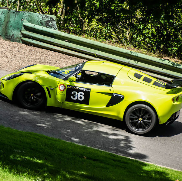 Porsche at Prescott 2019, #56 green lotus elige at speed during the porsche at prescott hill climb event