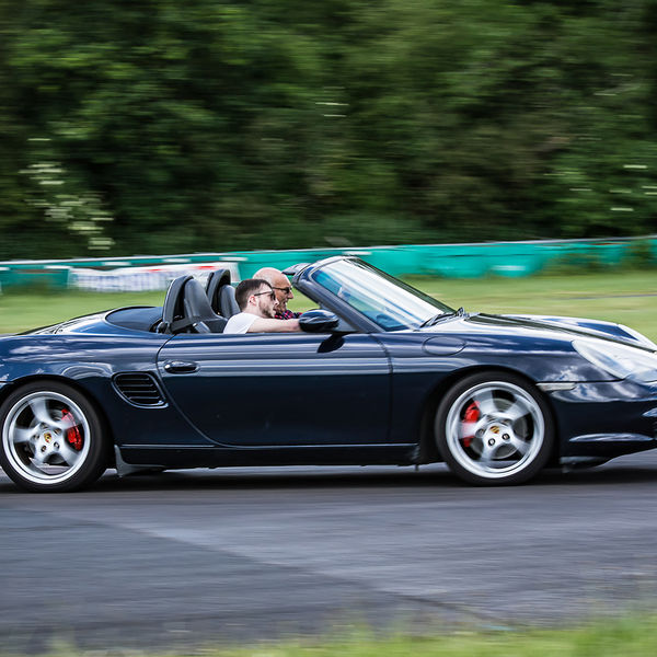 Porsche Club GB, R13, Track Day 2019, Curborough, #13 dark blue porsche boxster at speed on curborough sprint track