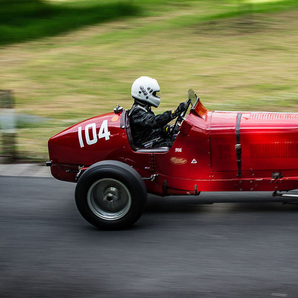 La Vie en Bleu 2019, Prescott Speed Hill Climb, #48 red vintage ERA single seat sports car speeding up prescott hill climb course