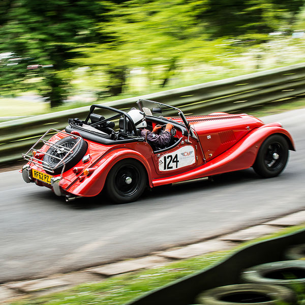 La Vie en Bleu 2019, Prescott Speed Hill Climb, #54 red morgan sports car at speed on prescott hill climb during the la vie en bleu event 2019