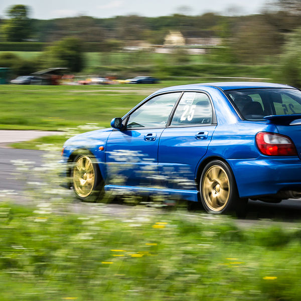 British Motorsports Marshals Sprint, Curborough Sprint Course, #42 blue subaru impreza hard on the brakes at flagpole corner