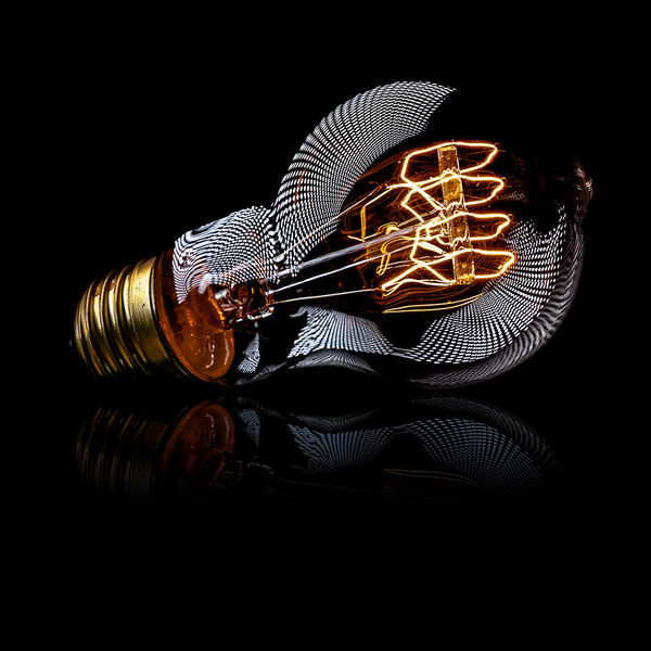steve-shelley-ssshoot-covid-lockdown-058 illuminated vintage lightbulb with polka dot reflections