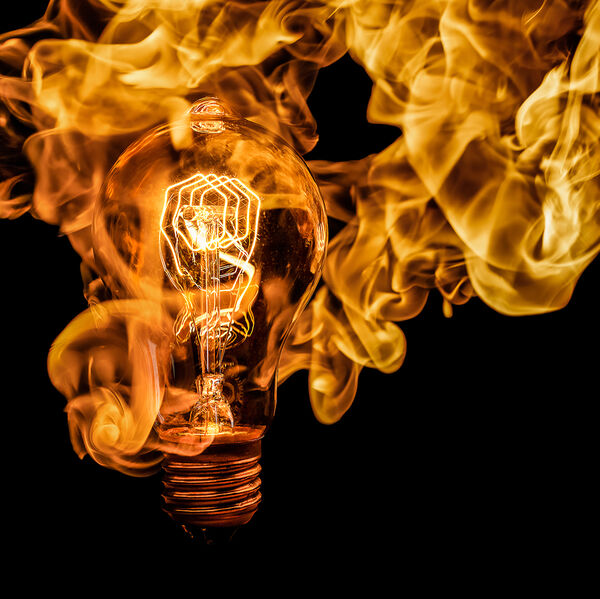 steve-shelley-ssshoot-covid-lockdown-002 vintage filament lightbulb engulfed in orange flames