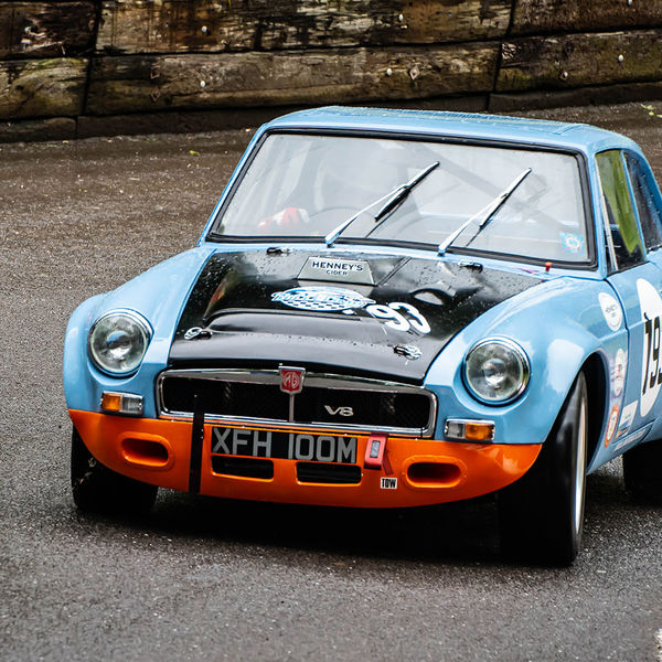 Classic Nostalgia 2019, Shelsley Walsh Hill Climb, #46 blue mgb gt v8 racing car at speed on shelsley walsh hill climb circuit
