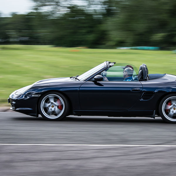 Porsche Club GB, R13, Track Day 2019, Curborough, #23 dark blue porsche boxster at speed on curborough sprint track