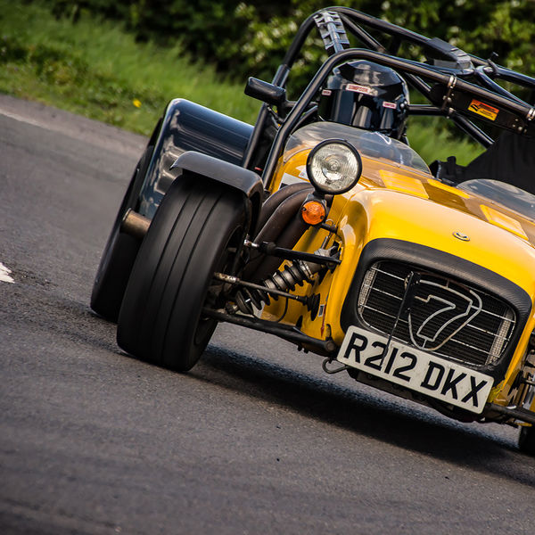 Lotus 7 Club Speed Championships, Curborough, #37 yellow caterham 7 rounding the fradley hairpin corner at curborough sprint track