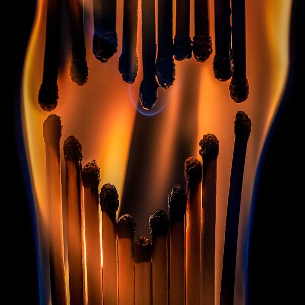 steve-shelley-ssshoot-covid-lockdown-033 heart shaped burning matches with orange and blue flames