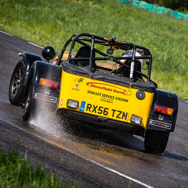 British Motorsports Marshals Sprint, Curborough Sprint Course, #01 Yellow Lotus 7 Caterham Westfield opposite lock in rain at Curborough Sprint Course