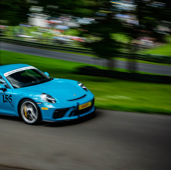 Porsche at Prescott 2019, #43 blue porsche 911 gt3rs at speed during the porsche at prescott hill climb event