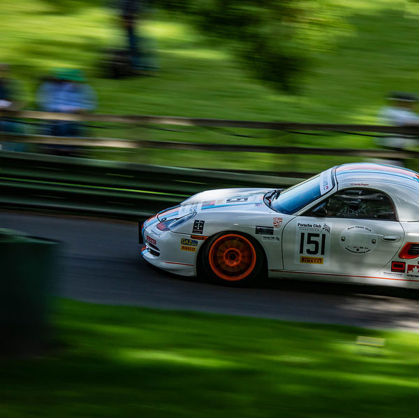 Porsche at Prescott 2019, #07 white porsche boxster at speed during the porsche at prescott hill climb event