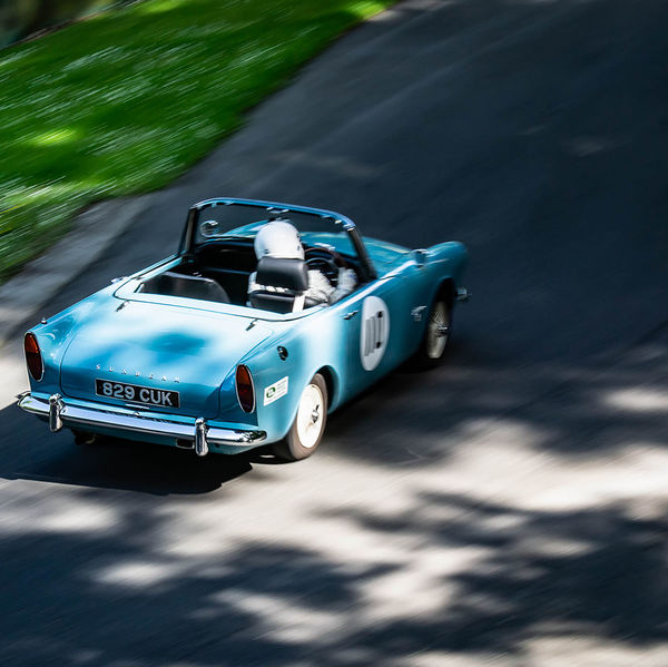 Porsche at Prescott 2019, #71 blue sunbeam alpine at speed during the porsche at prescott hill climb event