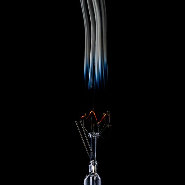 steve-shelley-ssshoot-covid-lockdown-072 broken light bulb filament burning with smoke trails
