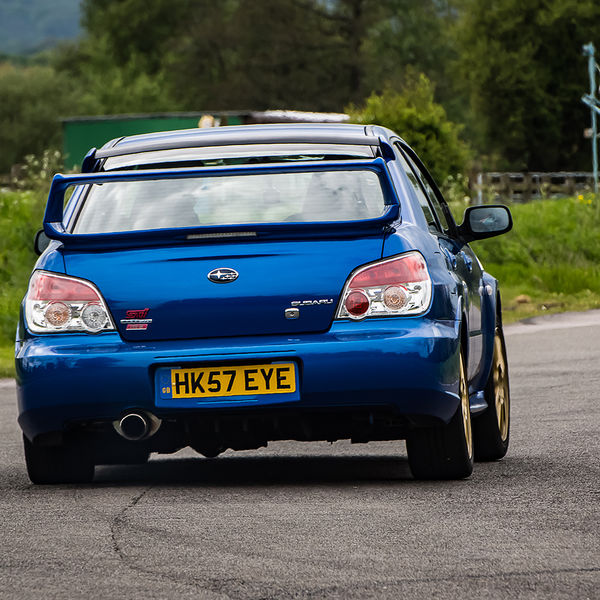 Quinton Motor Club May Track Day, Curborough, #09 Blue Subaru Impreza exiting the hairpin at speed on Curborough Sprint Course