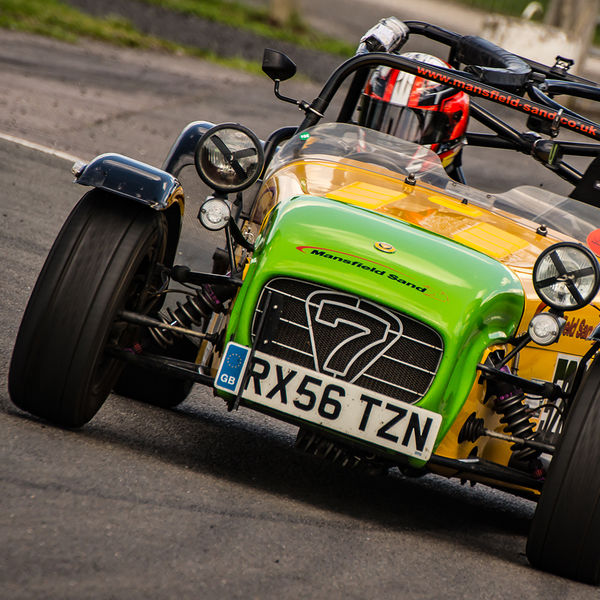 Lotus 7 Club Speed Championships, Curborough, #45 lime green and yellow caterham 7 rounding the fradley hairpin corner at curborough sprint track