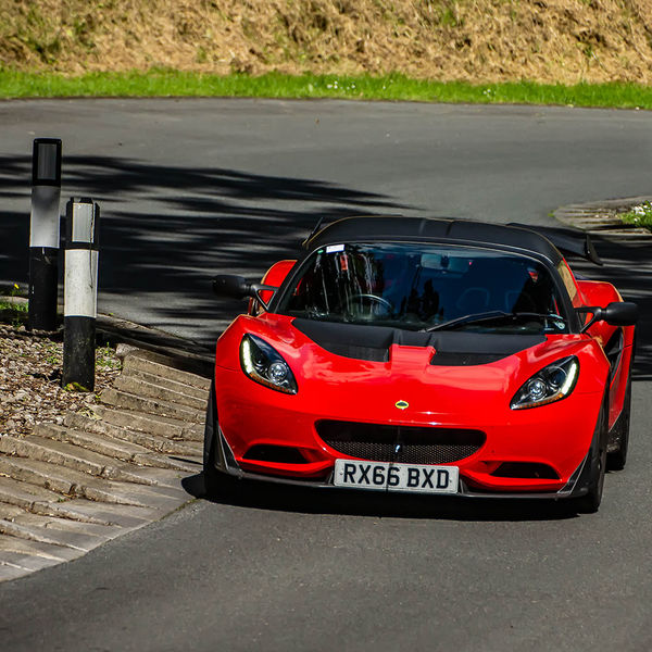 Porsche at Prescott 2019, #23 red lotus elise at speed during the porsche at prescott hill climb event