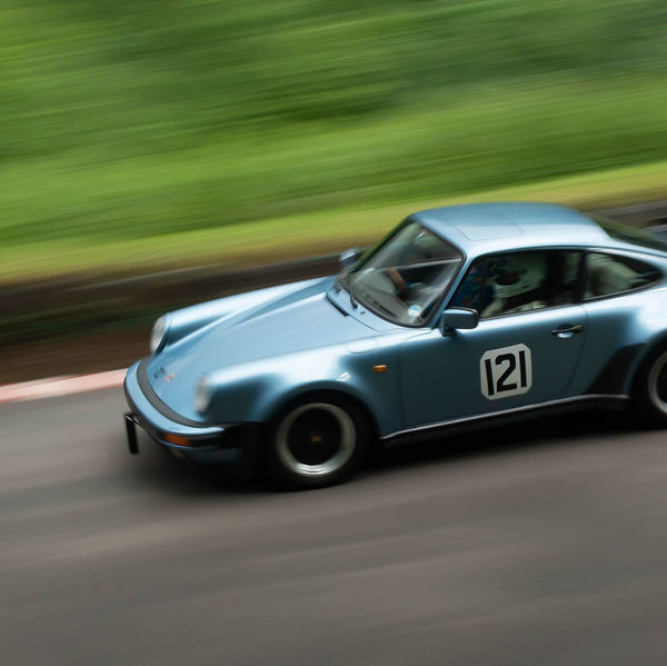 Classic Nostalgia 2019, Shelsley Walsh Hill Climb, #08 classic light blue porsche 911 racing car at speed on shelsley walsh hill climb circuit