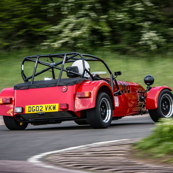 Lotus 7 Club Speed Championships, Curborough, #33 red caterham 7 rounding flag pole corner at curborough sprint track