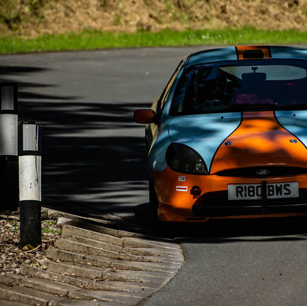 Porsche at Prescott 2019, #24 gulf coloured ford puma at speed during the porsche at prescott hill climb event