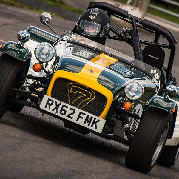 Lotus 7 Club Speed Championships, Curborough, #40 yellow and green caterham 7 rounding the fradley hairpin corner at curborough sprint track
