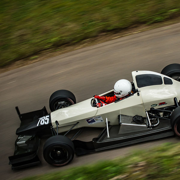 Best of British 2019, Shelsley Walsh, #44 cream coloured single seat racing car descending shelsley walsh hill climb at speed