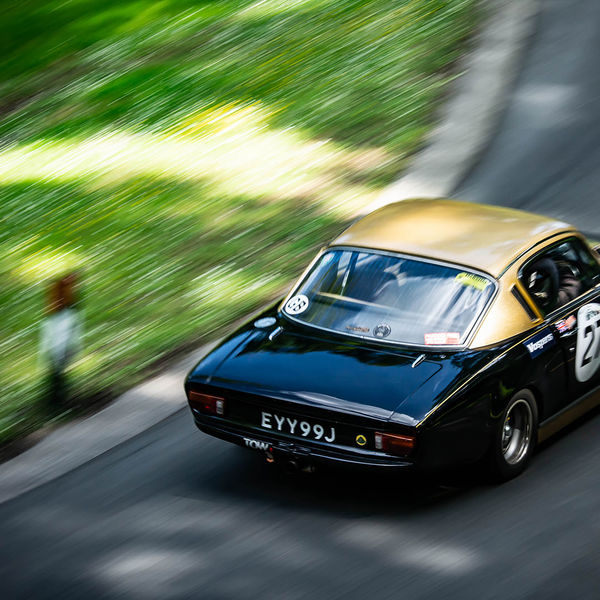 Porsche at Prescott 2019, #63 classic black lotus elan at speed during the porsche at prescott hill climb event