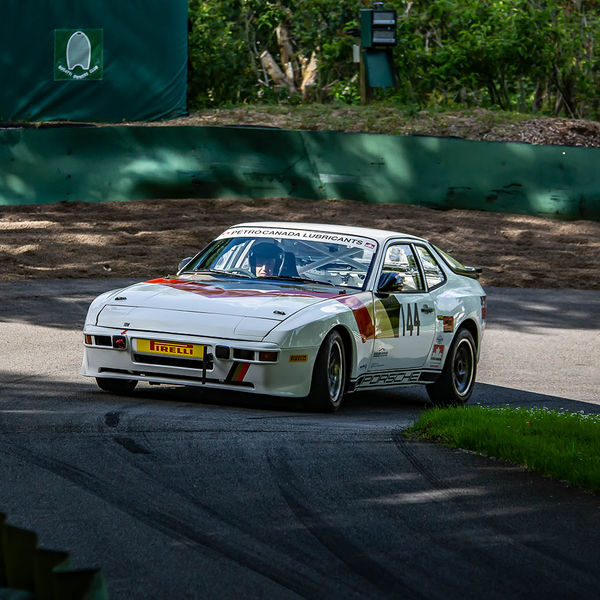 Porsche at Prescott 2019, #04 white porsche 944 at speed during the porsche at prescott hill climb event