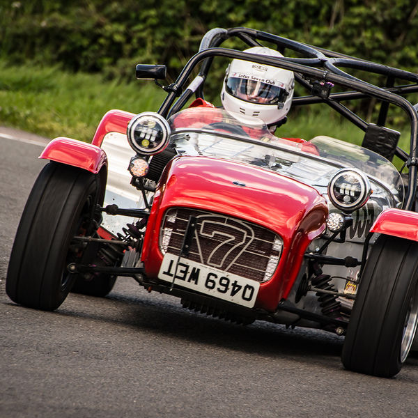 Lotus 7 Club Speed Championships, Curborough, #48 red and aluminium caterham 7 rounding the fradley hairpin corner at curborough sprint track