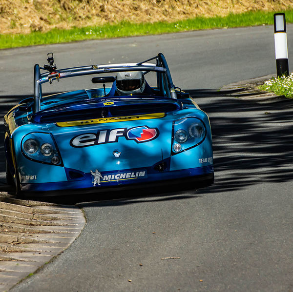 Porsche at Prescott 2019, #25 blue renault sport spider at speed during the porsche at prescott hill climb event