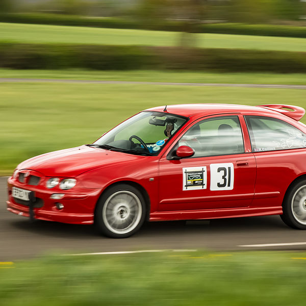 Curborough Sprint Championship 2019 - Round One - #42 bright red mg rover 25 at speed on curborough shenstone straight