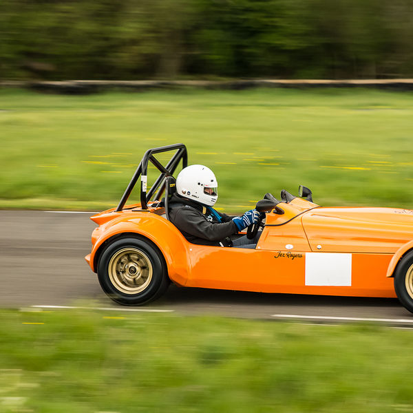 Quinton Motor Club May Track Day, Curborough, #25 Orange Lotus 7 Caterham Westfield at speed on Curborough Sprint Course