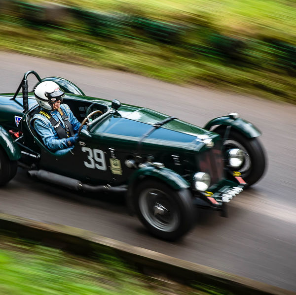 Classic Nostalgia 2019, Shelsley Walsh Hill Climb, #03 british racing green vintage racing car at speed on shelsley walsh hill climb circuit