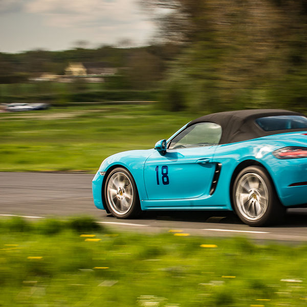 British Motorsports Marshals Sprint, Curborough Sprint Course, #41 bright blue porsche 911 cabrio braking hard at flagpole corner