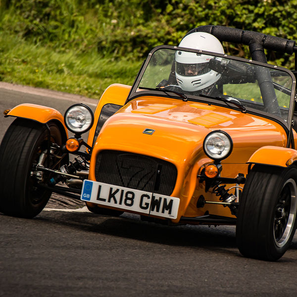 Lotus 7 Club Speed Championships, Curborough, #47 orange caterham 7 rounding the fradley hairpin corner at curborough sprint track
