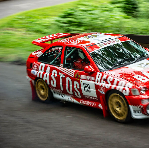 Classic Nostalgia 2019, Shelsley Walsh Hill Climb, #29 red ford escort cosworth racing car at speed on shelsley walsh hill climb circuit
