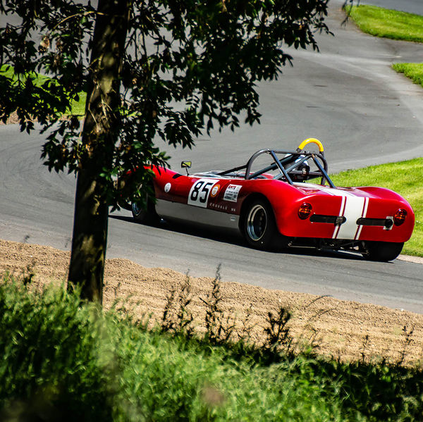 Porsche at Prescott 2019, #15 red classic sixties race car at speed during the porsche at prescott hill climb event