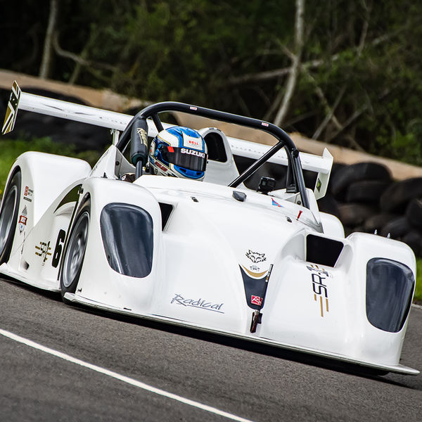 Curborough Sprint Championship 2019 - Round One - #32 white radical race car at speed through molehill corner at curborough sprint track
