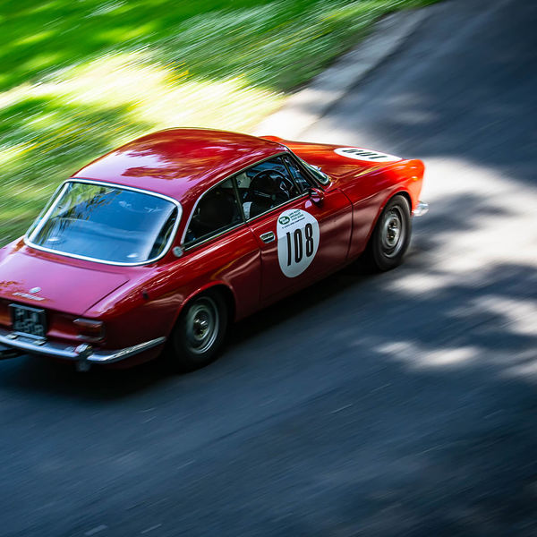 Porsche at Prescott 2019, #70 classic red alfa romeo at speed during the porsche at prescott hill climb event