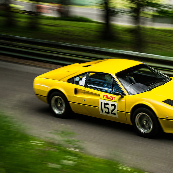 La Vie en Bleu 2019, Prescott Speed Hill Climb, #39 bright yellow ferrari 308 gtb racing car at speed amoungst the trees on prescott hill climb