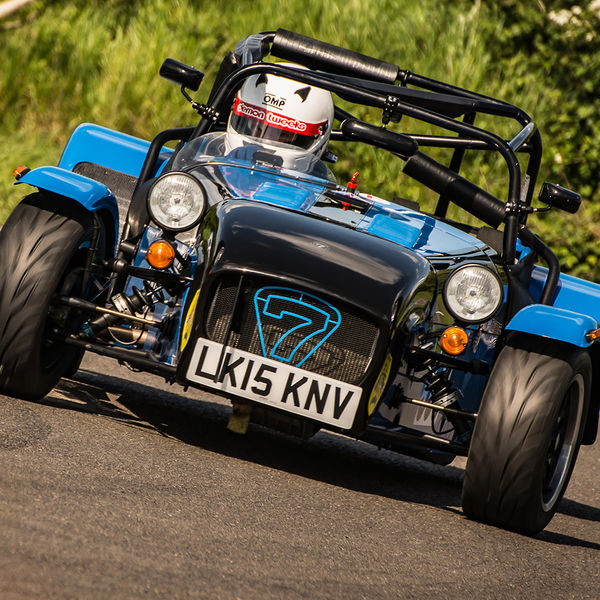Lotus 7 Club Speed Championships, Curborough, #51 bright blue caterham 7 rounding the fradley hairpin corner at curborough sprint track