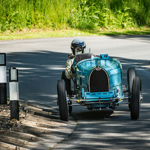 La Vie en Bleu 2019, Prescott Speed Hill Climb, #08 blue vintage bugatti sports car at speed through the corners at prescott hill climb