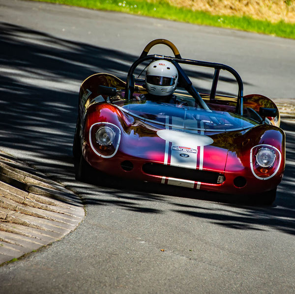 Porsche at Prescott 2019, #29 red classic sixties race car at speed during the porsche at prescott hill climb event