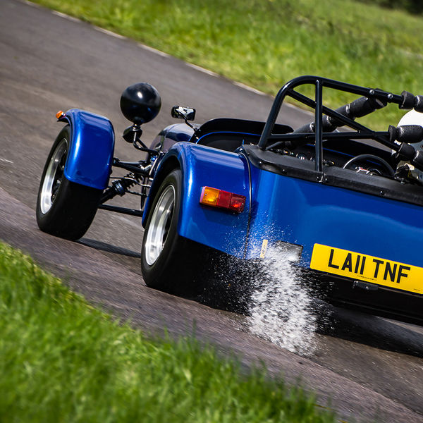 British Motorsports Marshals Sprint, Curborough Sprint Course, #12 Blue Lotus 7 Caterham Westfield through water at speed on Curborough Sprint Course