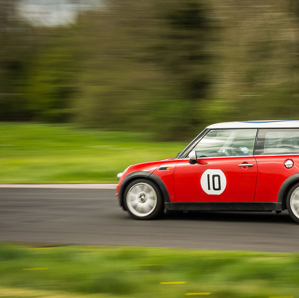 Curborough Sprint Championship 2019 - Round One - #11 red mini hatchback at speed on curborough shenstone straight