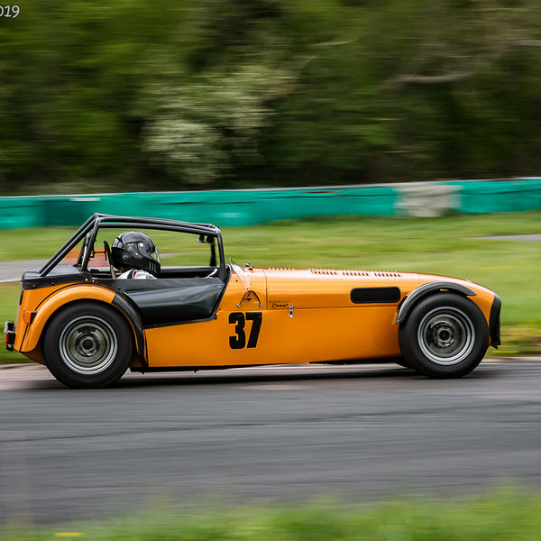 Curborough Sprint Championship 2019 - Round One - #07 orange lotus 7 caterham westfield negotiating flagpole corner during curborough sprint championship 2019