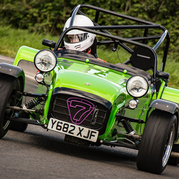 Lotus 7 Club Speed Championships, Curborough, #49 lime green caterham 7 rounding the fradley hairpin corner at curborough sprint track