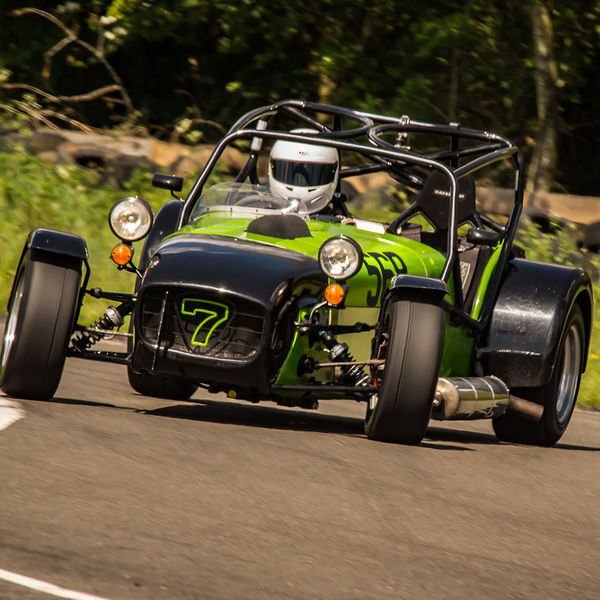 Lotus 7 Club Speed Championships, Curborough, #29 bright green caterham 7 opposite lock through curborough sprint course mole hill corner