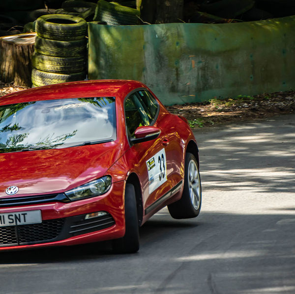 Porsche at Prescott 2019, #21 red volkswagen scirocco at speed during the porsche at prescott hill climb event